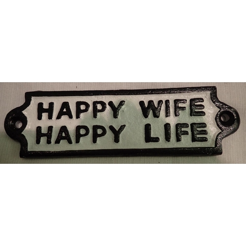 1078 - Cast iron Happy Wife plaque, 20 x 5 cm. P&P Group 1 (£14+VAT for the first lot and £1+VAT for subseq... 