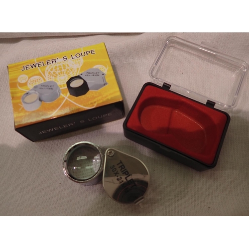 1102A - New old stock stainless steel folding 30 x 21 mm jewellers loupe with case. P&P Group 1 (£14+VAT for... 