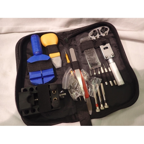 1106A - Cased 144 piece watch repair kit with clamps back openers etc. P&P Group 1 (£14+VAT for the first lo... 