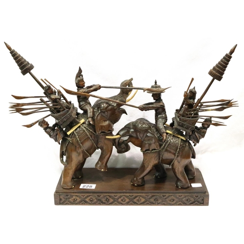 228 - Carved wooden Indian fighting elephants, L: 53 cm. P&P Group 3 (£25+VAT for the first lot and £5+VAT... 