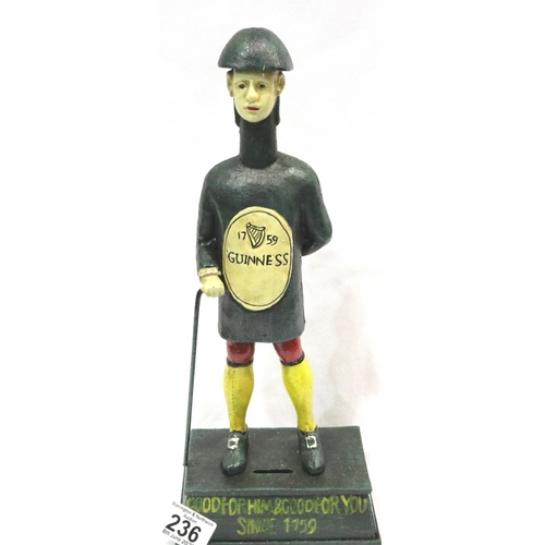 236 - Large cast iron novelty Guinness figural money box, H: 30 cm. P&P Group 2 (£18+VAT for the first lot... 