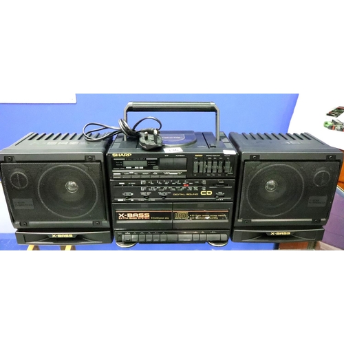 336 - Sharp GX-CD60E CD, twin cassette and radio with detachable speaker. Not available for in-house P&P, ... 