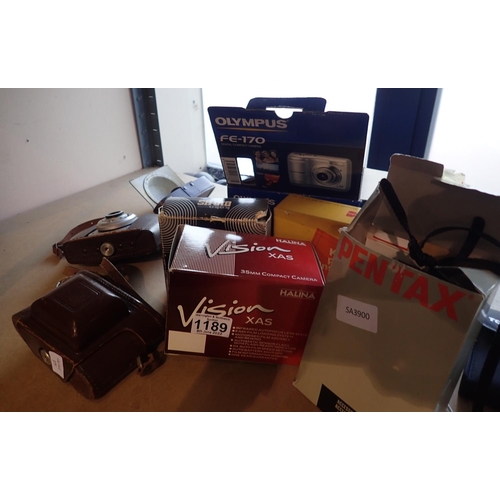1189 - Shelf of mixed cameras, various makes and models. Not available for in-house P&P, contact Paul O'Hea... 