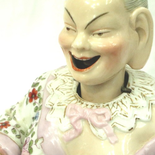 218 - A late 19th Century German Ernst Bohne & Sohne porcelain nodding pagoda figure, with weighted noddin... 