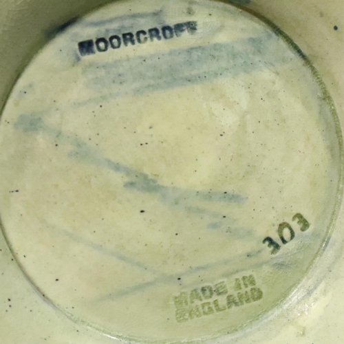 190 - Large Moorcroft blue ground vase in the Pomegranate pattern, H: 19 cm. Condition report: No chips or... 