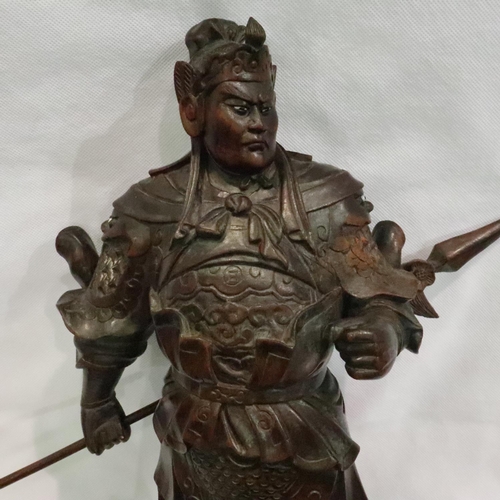 209 - Carved Oriental warrior with stone eyes, H: 45 cm. P&P Group 3 (£25+VAT for the first lot and £5+VAT... 