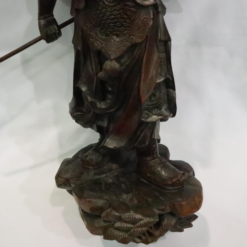 209 - Carved Oriental warrior with stone eyes, H: 45 cm. P&P Group 3 (£25+VAT for the first lot and £5+VAT... 