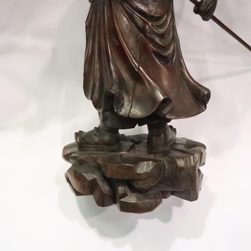 209 - Carved Oriental warrior with stone eyes, H: 45 cm. P&P Group 3 (£25+VAT for the first lot and £5+VAT... 