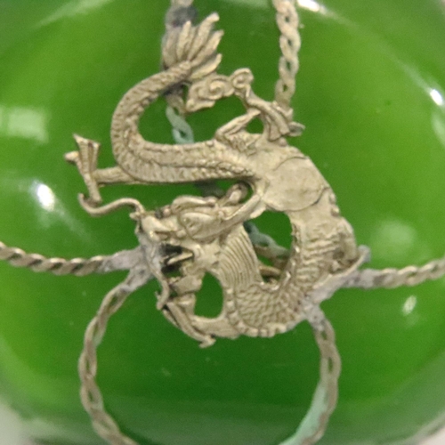 210 - Chinese green jade bottle with white metal dragon decoration, H: 75 mm. P&P Group 1 (£14+VAT for the... 