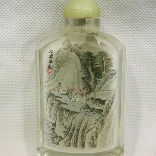 213 - Oriental glass snuff bottle with mountain scenes, H: 60 mm. P&P Group 1 (£14+VAT for the first lot a... 
