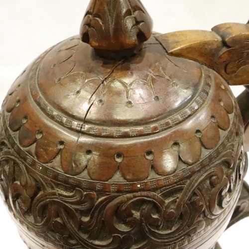 227 - 19th century large heavily carved, walnut lidded stein, H: 34 cm. Crack from below handle to the cen... 