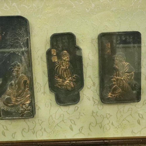 230 - Large framed tableau of eighteen cast bronze Chinese blocks featuring Chinese figures, 95 x 68 cm. N... 
