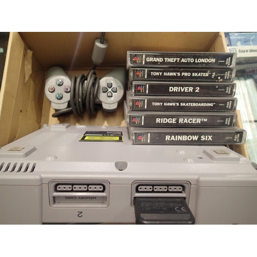 2143 - Sony Playstation PS1 console, with one controller and six games, lacking power supply and AV connect... 