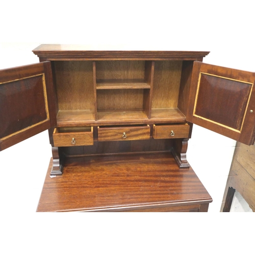 3107 - 20th century mahogany dresser of small proportions, double cupboard, the doors carved, 77 x 43 x 133... 