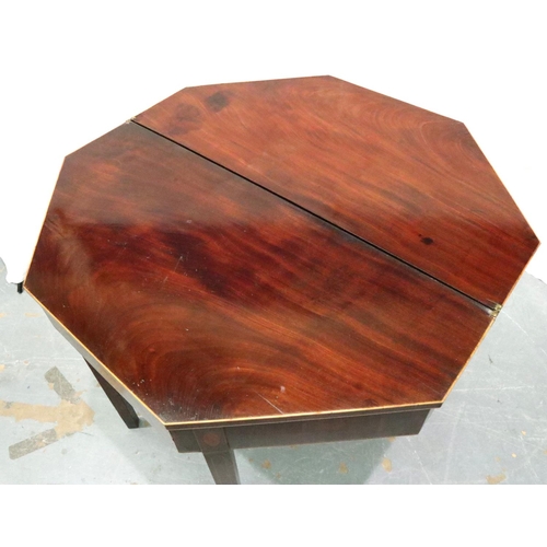 3110 - George III walnut hexagonal fold over tea table, inlaid with satinwood and ebony, raised on tapered ... 