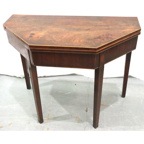 3110 - George III walnut hexagonal fold over tea table, inlaid with satinwood and ebony, raised on tapered ... 