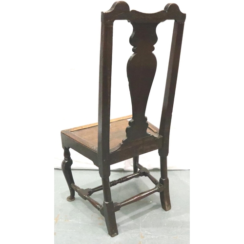 3113 - A 17th century oak hall chair, with Carolean carved back rest and panelled seat, H: 107 cm. Not avai... 