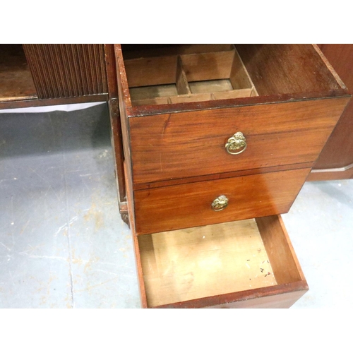 3115 - A Regency mahogany twin pedestal sideboard, each cupboard fitted with drawers and cellarette, the ce... 