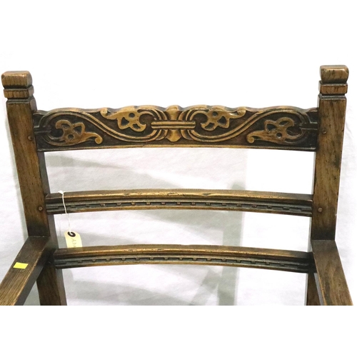 3125 - A set of six elm dining chairs, with carved laddered back rails and studded leather seats. Not avail... 