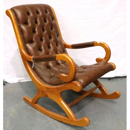 3132 - 20th century beech framed rocker, with buttoned Chesterfield style brown leather upholstery, H: 95 c... 