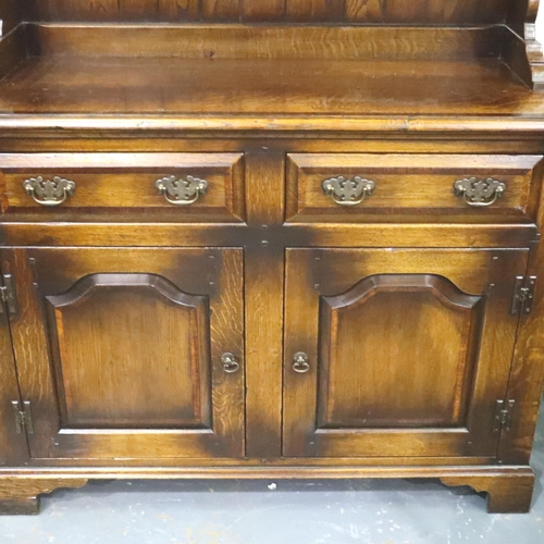 3135 - RE Forster, Warrington, a 20th century oak dresser in the 18th century style, cross banded and panel... 