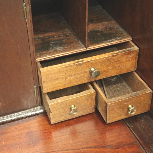 3146 - George III oak diminutive bureau, the fall front with fitted interior, faux top drawer with slide co... 