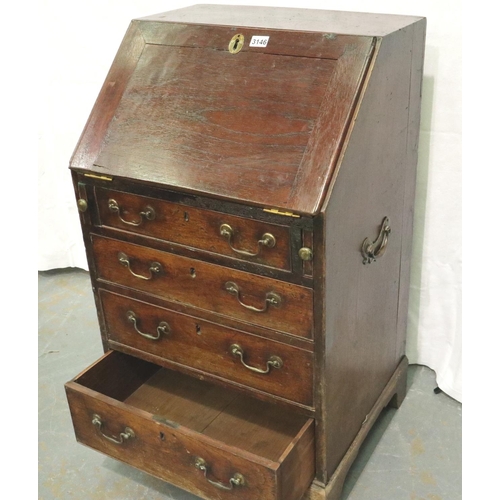 3146 - George III oak diminutive bureau, the fall front with fitted interior, faux top drawer with slide co... 