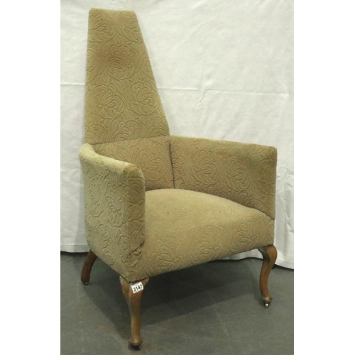 3147 - An unusual early 20th century tub chair with high back of tapering form, raised on walnut supports, ... 