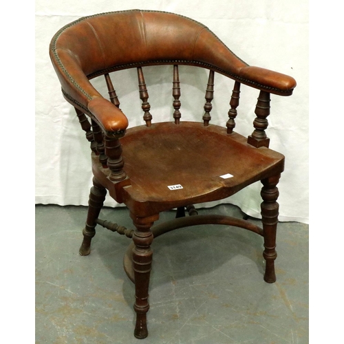 3149 - A late 19th century elm desk chair, with later studded leatherette padded arms and back rest, turned... 