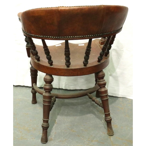 3149 - A late 19th century elm desk chair, with later studded leatherette padded arms and back rest, turned... 