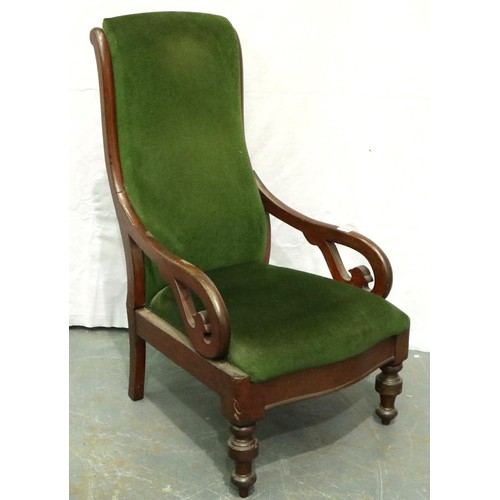 3152 - A Victorian mahogany framed low seated parlour chair, upholstered in green velvet with scrolling arm... 