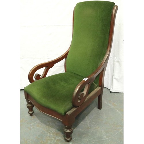 3152 - A Victorian mahogany framed low seated parlour chair, upholstered in green velvet with scrolling arm... 