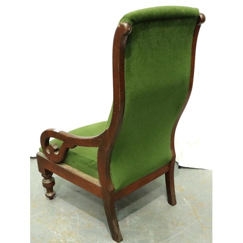 3152 - A Victorian mahogany framed low seated parlour chair, upholstered in green velvet with scrolling arm... 