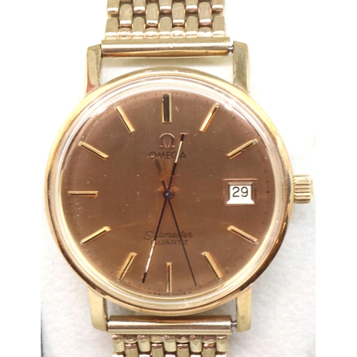 72 - Omega: 9ct gold Seamaster quartz wristwatch with 9ct gold bracelet, boxed, requires battery. Total 6... 