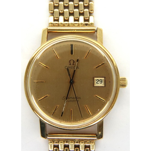 72 - Omega: 9ct gold Seamaster quartz wristwatch with 9ct gold bracelet, boxed, requires battery. Total 6... 