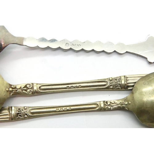 121 - Set of six white metal glass holders marked with a crown 95% matching spoons and silver plated ladle... 