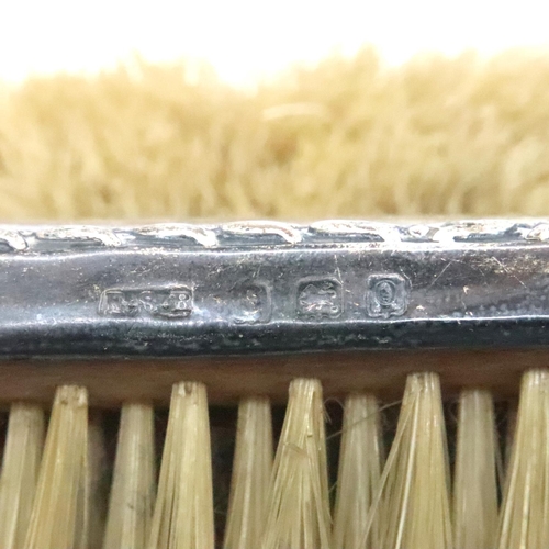 136 - Four hallmarked silver hair brushes including three guilloche examples. P&P Group 2 (£18+VAT for the... 