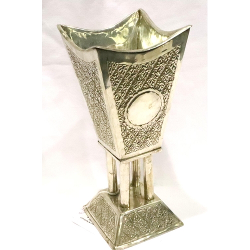 141 - Middle-Eastern white metal footed candle holder with engraved decoration, H: 26 cm, weighted, unmark... 