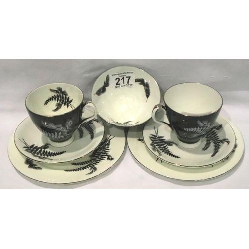 217 - Two Royal Albert Night & Day pattern trio and a matching sugar bowl. P&P Group 2 (£18+VAT for the fi... 