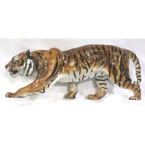 229 - Royal Doulton stalking tiger figurine, L: 34 cm. No marks in body, no crazing and no chips, cracks o... 