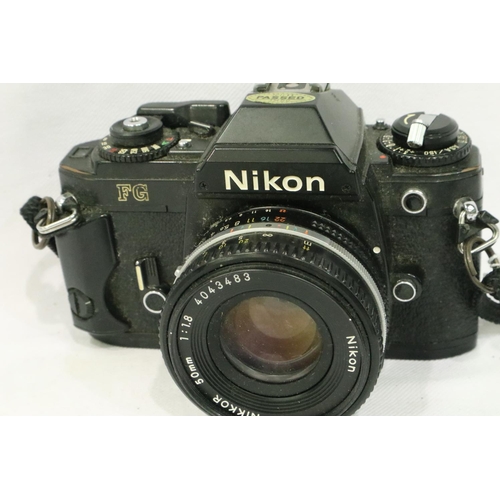 395 - Nikon FG film camera 50mm 1-1.8 lens and a Nikon 75-150mm 1-3.5 lens. P&P Group 2 (£18+VAT for the f... 