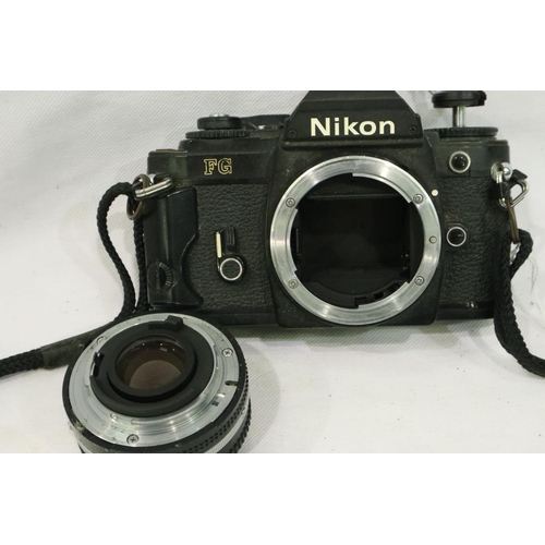 395 - Nikon FG film camera 50mm 1-1.8 lens and a Nikon 75-150mm 1-3.5 lens. P&P Group 2 (£18+VAT for the f... 