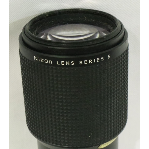 395 - Nikon FG film camera 50mm 1-1.8 lens and a Nikon 75-150mm 1-3.5 lens. P&P Group 2 (£18+VAT for the f... 