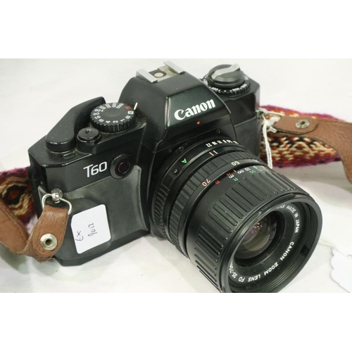 396 - Canon T60 camera with Canon Zoom lens, Tamron 80-210 lens and Mamiya flash. P&P Group 2 (£18+VAT for... 