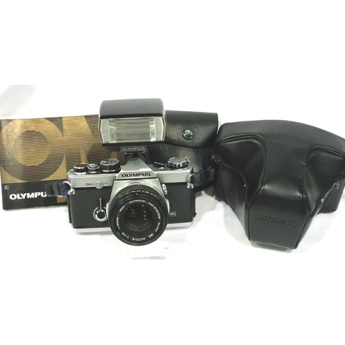 397 - Olympus OM2N with Zuiko 1:1.8 50mm lens, with case, working at lotting and an Olympus T20 dedicated ... 