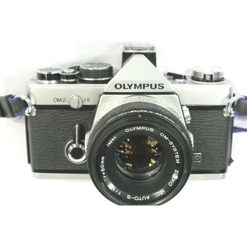 397 - Olympus OM2N with Zuiko 1:1.8 50mm lens, with case, working at lotting and an Olympus T20 dedicated ... 