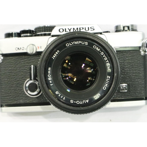 397 - Olympus OM2N with Zuiko 1:1.8 50mm lens, with case, working at lotting and an Olympus T20 dedicated ... 