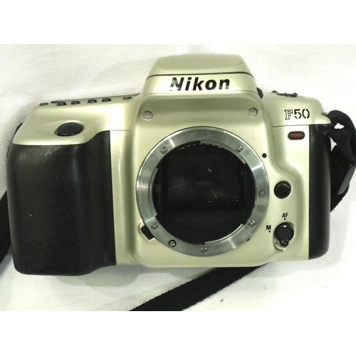 403 - Nikon F50 film camera with Sigma Apo AF 75-300 4.5-5.6 plus extras, camera functioning, lens focusin... 