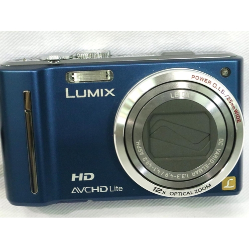 406 - Panasonic Lumix T210 camera with accessories. P&P Group 2 (£18+VAT for the first lot and £3+VAT for ... 