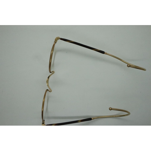 94A - Early 20th century pair of 1/10 gold and tortoiseshell framed spectacles, cased. P&P Group 1 (£14+VA... 